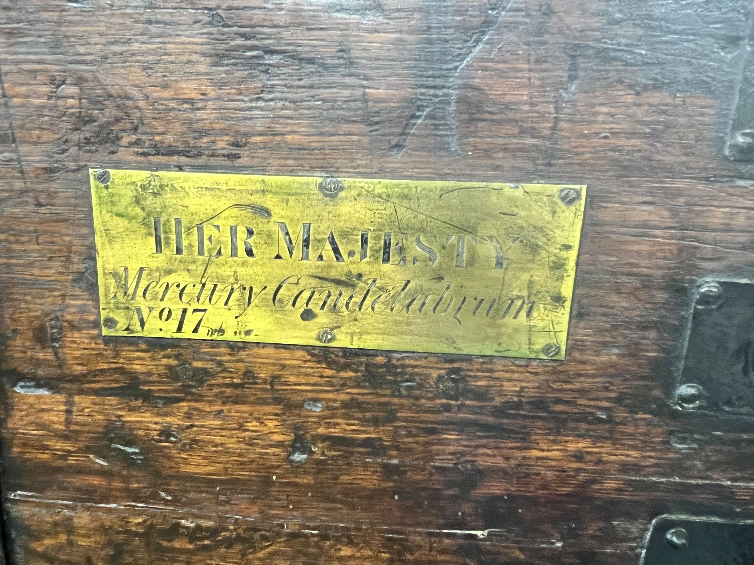 A Victorian iron bound oak silver chest, with engraved brass plaque 'Her Majesty Mercury Candelabrum No.17', width 81cm depth 56cm height 62cm